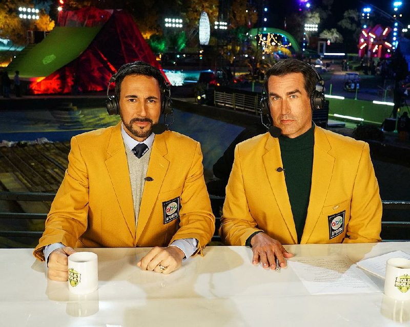 Joe Tessitore (left) and Rob Riggle provide commentary on the ABC competition series Holey Moley.
