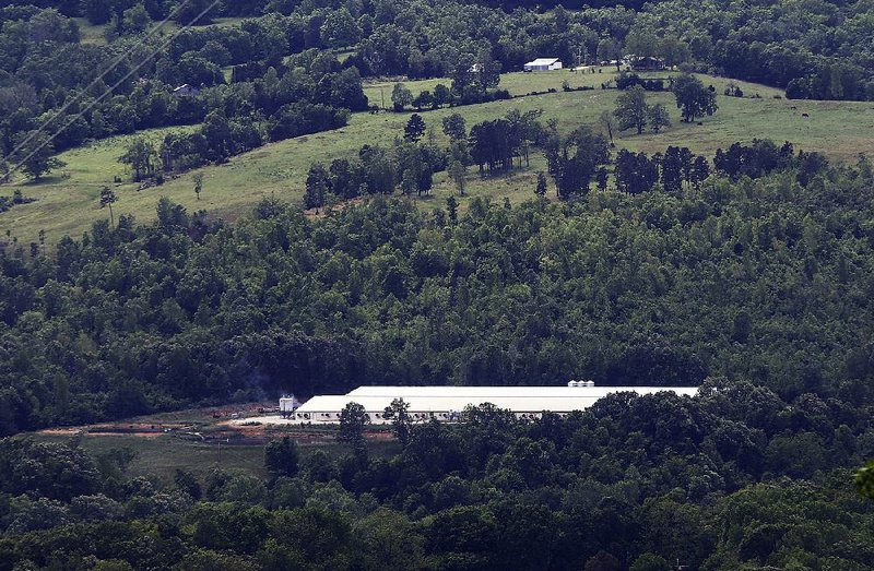 FILE — The C&H Hog Farms complex, shown in 2017, was located on Big Creek 6.6 miles from where the creek flows into the Buffalo River. 