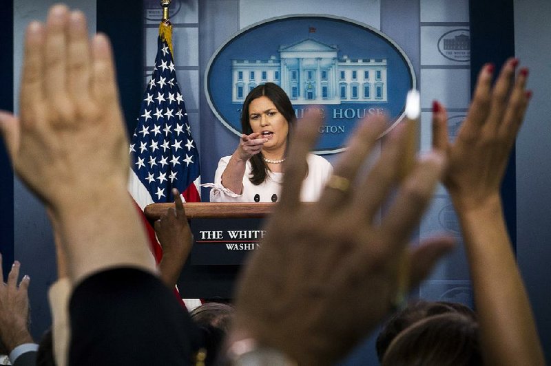 White House press secretary Sarah Huckabee Sanders holds a daily press briefing in July. Sanders sometimes clashed with reporters and the briefings became few and far between. 