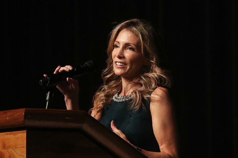 Former Olympic gymnastics medalist Shannon Miller speaks Thursday at the Arkansas Bar Association gathering at the Hot Springs Convention Center.