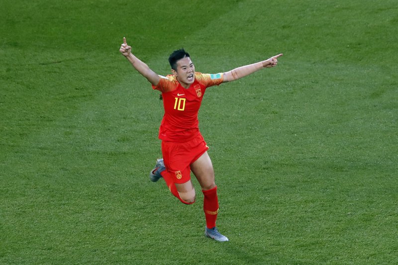 The Associated Press GAME WINNER: China's Li Ying, right, celebrates after scoring her side's goal Thursday during the Women's World Cup Group B soccer match against South Africa at the Parc des Princes in Paris, France.