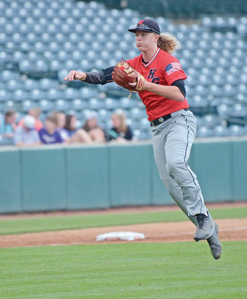 Harmony Grove junior infielder Jared Toler throws the ball during the Class 3A state-championship game at Baum-Walker Stadium at the University of Arkansas at Fayetteville. The Cardinals defeated Central Arkansas Christian 4-3 to win their school’s first-ever state championship in baseball.