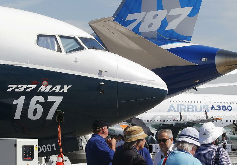 Boeing planes were on display at the Paris Air Show in 2017. The aerospace company faces uncertainty over the future of its troubled 737 Max airliner ahead of this year’s show, which begins Monday. 