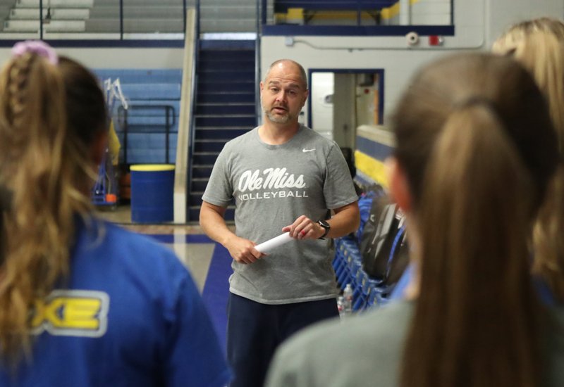 The Sentinel-Record/Richard Rasmussen TALKING VOLLEYBALL: Ole Miss head volleyball coach Steve McRoberts talks with Lakeside Ram volleyball players during a camp Thursday. This was McRoberts' second visit to Lakeside for the two-day camp that wrapped up Friday.