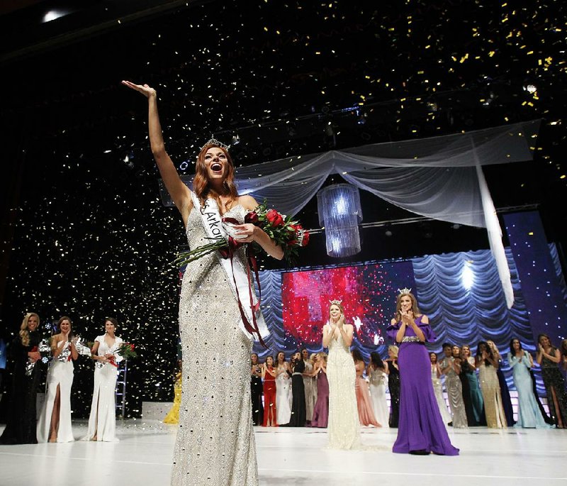 Darynne Dahlem of Greenwood reacts after being crowned 2019 Miss Arkansas on Saturday at the Robinson Performance Hall in Little Rock. More photos are available at arkansasonline.com/616missarkansas/ 