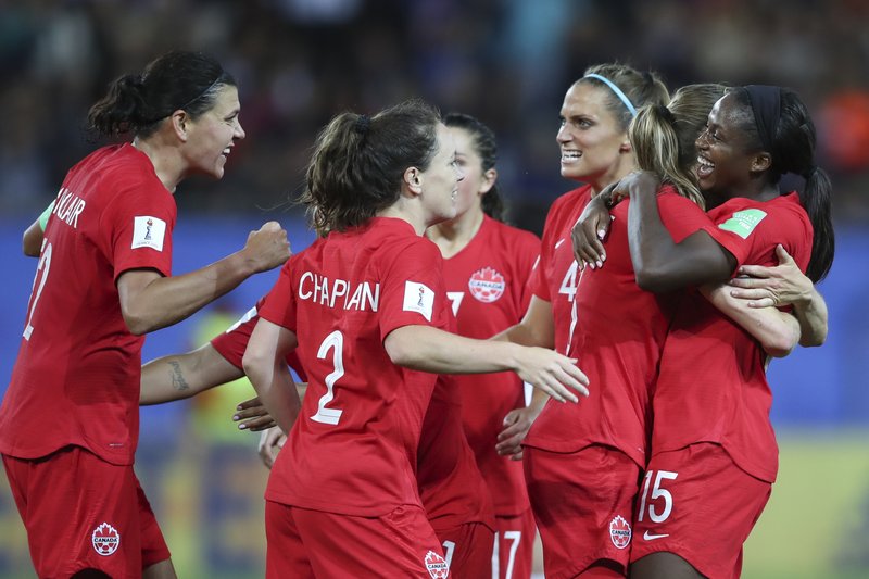 Canada's Nichelle Prince, right, celebrates with her teammates after scoring her side's second goal during the Women's World Cup Group E soccer match between Canada and New Zealand in Grenoble, France, Saturday, June 15, 2019. (AP Photo/Francisco Seco)