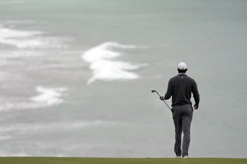 Tiger Woods walks to the ninth green during the third round of the U.S. Open Championship golf tournament, Saturday, June 15, 2019, in Pebble Beach, Calif. (AP Photo/Carolyn Kaster)