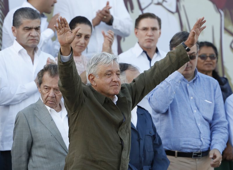 Mexican President Andres Manuel Lopez Obrador receives the applause of the crowd during a rally in Tijuana, Mexico, Saturday, June 8, 2019. (AP Photo/Eduardo Verdugo)