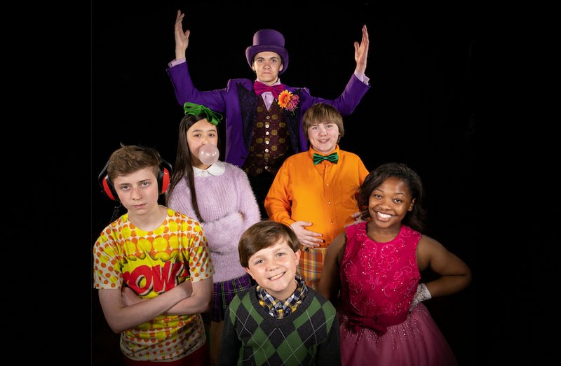 The cast of Willy Wonka Jr. at the Arkansas Repertory Theatre (clockwise from left): Corbin Pitts as Mike Teavee, Isabella Nguyen as Violet Beauregarde, Will Porter as Willy Wonka, Jacob Grinder as Augustus Gloop, Tania Kelley as Veruca Salt and Collin Carlton as Charlie Bucket. (Special to the Democrat-Gazette/CHRIS CRANFORD)