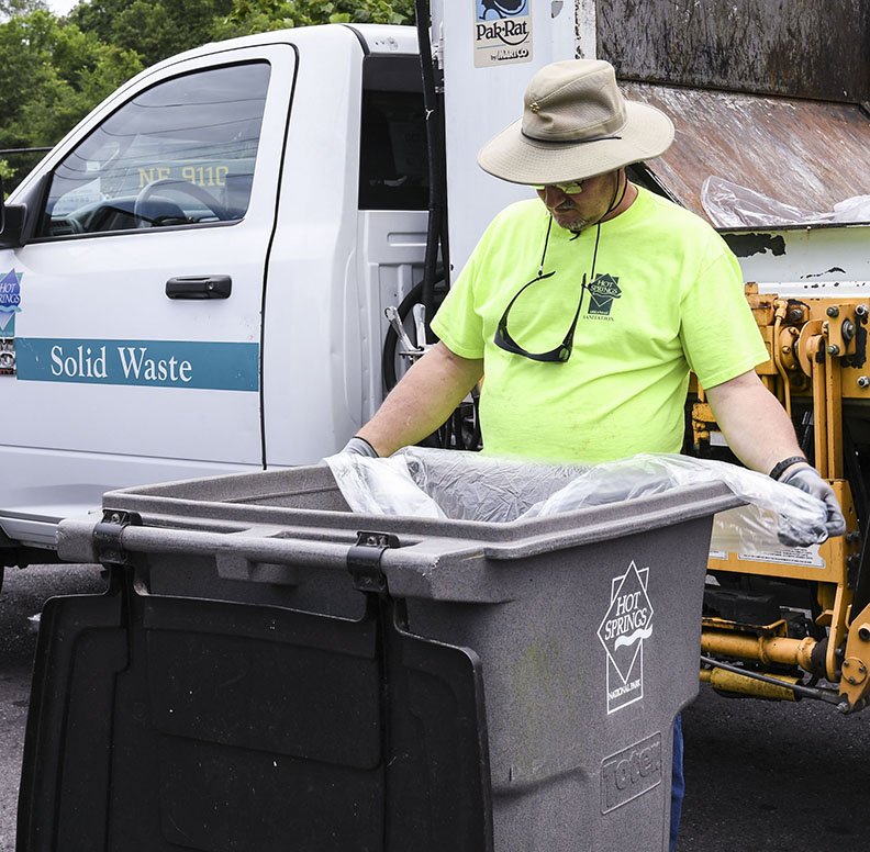 The Sentinel-Record/Grace Brown- City of Hot Springs employee Greg Ball performs maintenance tasks at the recycling facility, 218 Runyon Street, on Sunday, June 16, 2019.