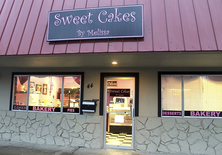 This Feb. 5, 2013, file photo, shows exterior of the now closed Sweet Cakes by Melissa in Gresham, Ore. The Supreme Court is throwing out an Oregon court ruling against bakers who refused to make a wedding cake for a same-sex couple. The move keeps the high-profile case off the court's election-year calendar and orders state judges to take a new look at the dispute between the lesbian couple and the owners of a now-closed bakery. The justices already have agreed to decide whether federal civil rights law protects people from job discrimination due to their sexual orientation or gender identity. (Everton Bailey Jr./The Oregonian via AP)