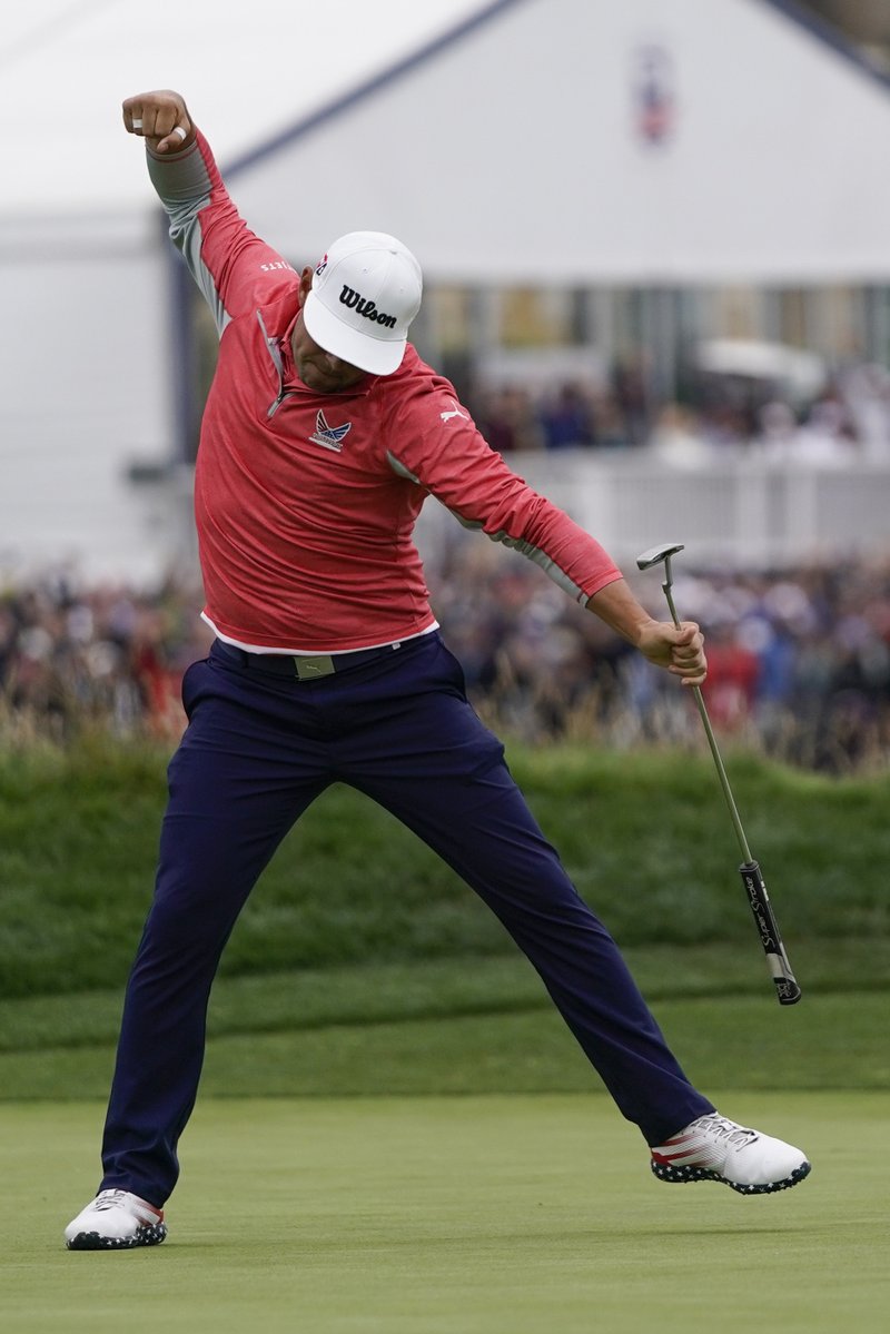 The Associated Press HISTORY DENIED: Gary Woodland celebrates after winning the U.S. Open Championship Sunday in Pebble Beach, Calif. Woodland's win denied runner-up Brooks Koepka his third straight US Open title.