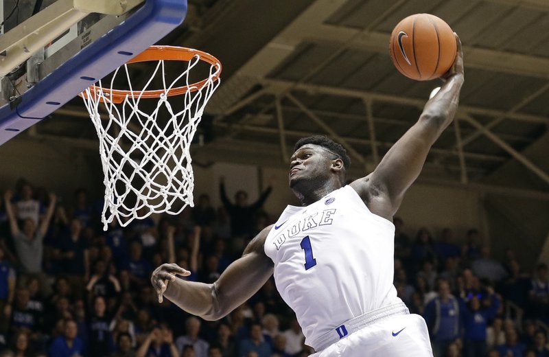 FILE - In this Jan. 5, 2019, file photo, Duke's Zion Williamson (1) dunks during the second half of an NCAA college basketball game against Clemson, in Durham, N.C. The Blue Devils freshman is widely expected to be the No. 1 overall pick in the NBA draft on Thursday, June 20. (AP Photo/Gerry Broome, File)