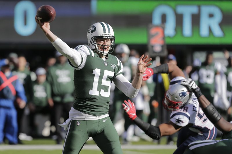 The Associated Press HANGING IT UP: In this Nov. 25, 2018, file photo, New York Jets quarterback Josh McCown (15) throws a pass in an NFL game against the New England Patriots in East Rutherford, N.J. McCown has announced he is retiring from playing football after an NFL career that spanned 16 NFL seasons and included stints with 10 teams. McCown, who turns 40 on July 4, writes in a piece for The Players' Tribune on Monday, that he will be helping coach his two sons -- also quarterbacks -- in high school this year.