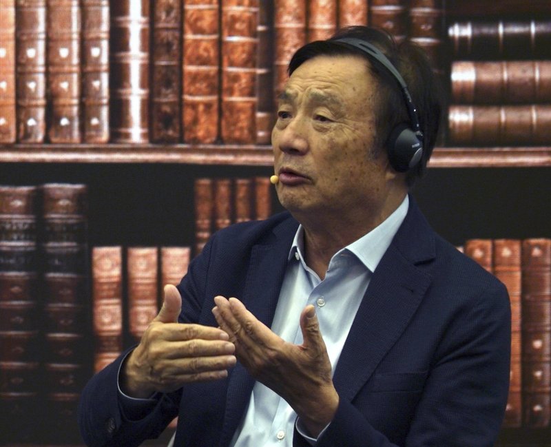 Huawei founder Ren Zhengfei speaks at a roundtable at the telecom giant's headquarters in Shenzhen in southern China on Monday, June 17, 2019. Huawei's founder has likened his company to a badly damaged plane and says revenues will be $30 billion less than forecast over the next two years. (AP Photo/Dake Kang)