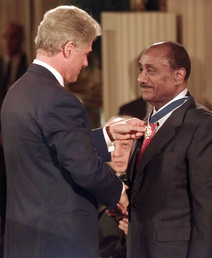 John H. Johnson (right), chief executive officer of Johnson Publishing, received a Presidential Medal of Freedom from President Bill Clinton in 1996. (AP)