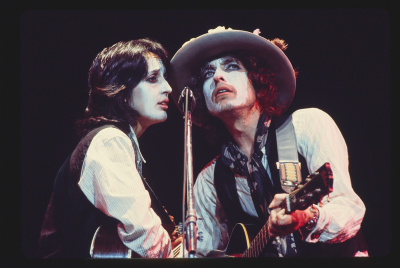 Bob Dylan and Joan Baez, in white-face makeup, perform during Dylan’s 1975-76 Rolling Thunder Revue tour. A new documentary, "Rolling Thunder Revue: A Bob Dylan Story,” directed by Martin Scorsese, is now streaming on Netflix. (Courtesy Netflix/AP)
