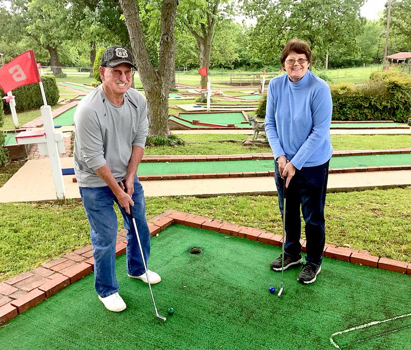Janelle Jessen/Herald-Leader Rodney and Elaine Carr of West Siloam Springs, Okla., are owners of the Oak Tree Event Center and Mini Golf Course.