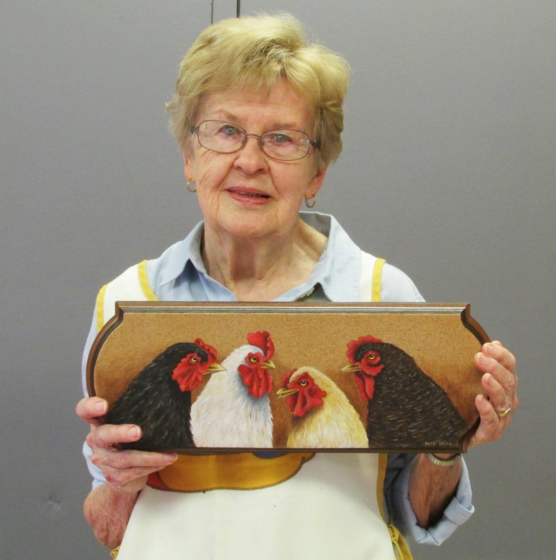Photo submitted Ruth Klotz is shown featuring her painting of &quot;The Hen Party&quot; at the June BVDA meeting.
