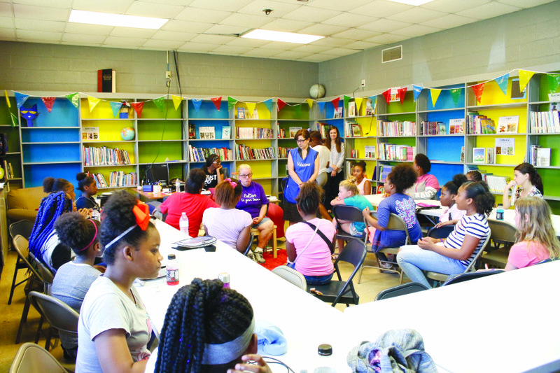 Class: Liz Slater and Angelica Wurth talk to children at the Boys and Girls Club of El Dorado about responsible pet ownership. Michael Shine/News-Times