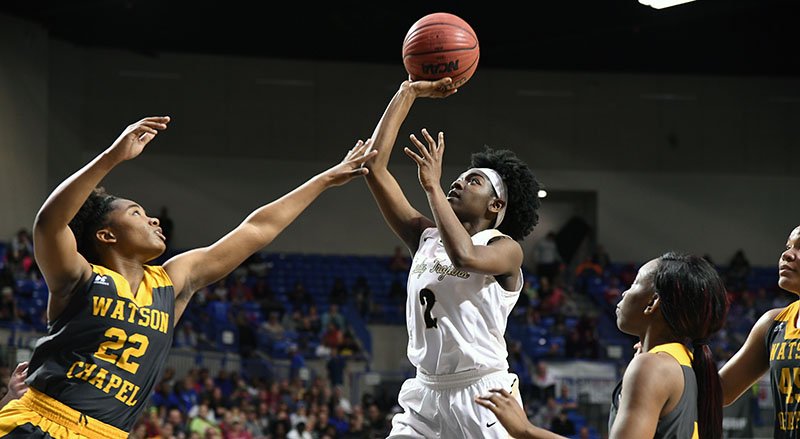 The Sentinel-Record/Grace Brown BACK AT HOME: Hot Springs' Imani Honey (2) goes for a basket as Watson Chapel's Kaelyn Irby (22) defends during the Class 5A girls state championship game at Bank of the Ozarks Arena on March 10, 2018. Honey, who started taking classes at National Park last semester, recently signed to play basketball for head coach Marvin Moody and the Nighthawks.