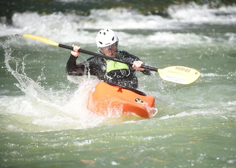 Danner Hutchison, a University of Arkansas student from Dripping Springs, Texas, practices eskimo rolls on Wednesday June 19 2019 at the Siloam Springs Kayak Park on the Illinois River. Students with the university's UREC Outdoors program trained at the park, honing paddling and rescue skills to become guides and lead students on river trips. The free kayak park is open for paddling and swimming 2 miles south of Siloam Springs at 19253 Fisher Ford Road.