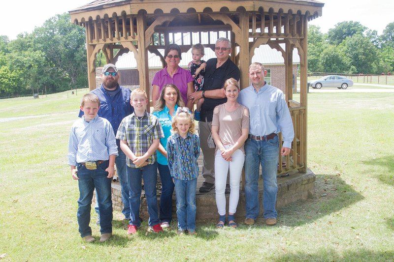 Ouida and Lester Cossey, owners of Flying C Ranch of Searcy, are the 2019 White County Farm Family of the Year. Pictured are, front row, from left, Cole, Joseph and Aimsley Cossey; middle row, Michael, Elain, Aimee and Thomas Cossey; and back row, Ouida, Libby and Lester Cossey.