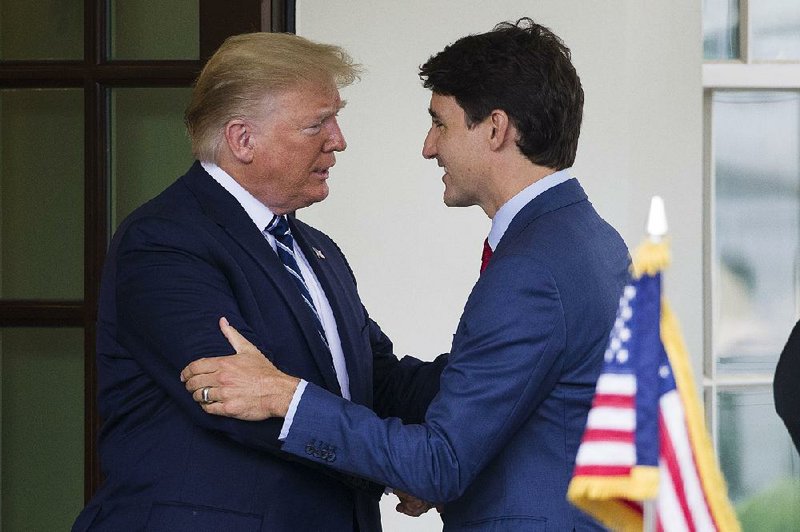 President Donald Trump greets Canadian Prime Minister Justin Trudeau at the White House on Thursday before their meeting to discuss the U.S.-Mexico-Canada Agreement. 