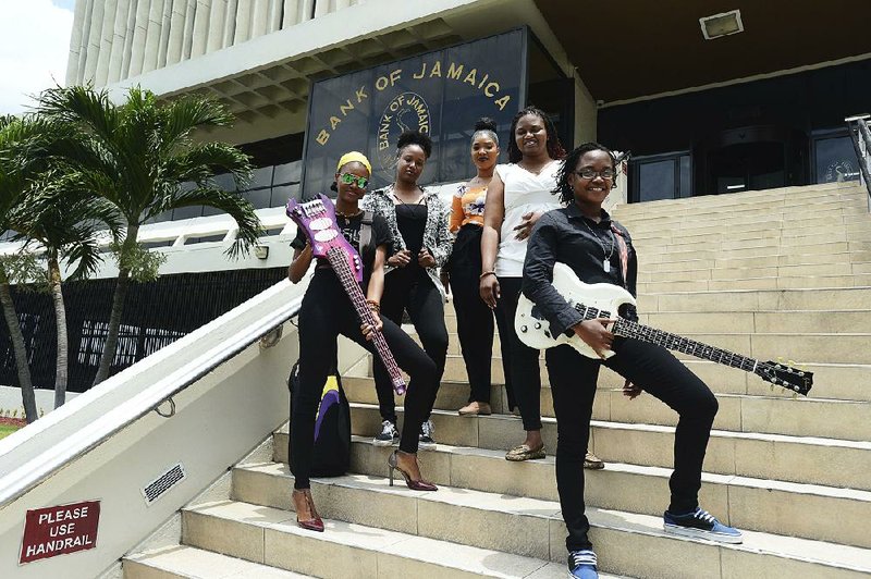 Chevanese Palmer (from left), Karissa Palmer, Gabeana Campbell, Tashana Barnett and Shadeeka Daughma — members of the the band ADAHEZ — are among the groups used by Jamaica’s central bank to promote the country’s economy using reggae songs. 
