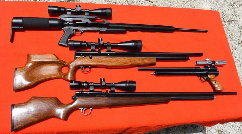 Seth Rowland’s air rifle arsenal includes a .457-cal. Air Force Texan (top), a .58-cal Haley (middle) and a .458-cal. Quackenbush. The pistol, which Rowland does not use for deer hunting, is a .58-cal. Quackenbush. 