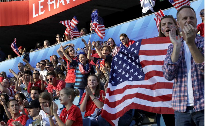 US fans wait for the start of the Women's World Cup Group F soccer match between Sweden and the United States at Stade Océane, in Le Havre, France, Thursday, June 20, 2019. (AP Photo/Alessandra Tarantino)