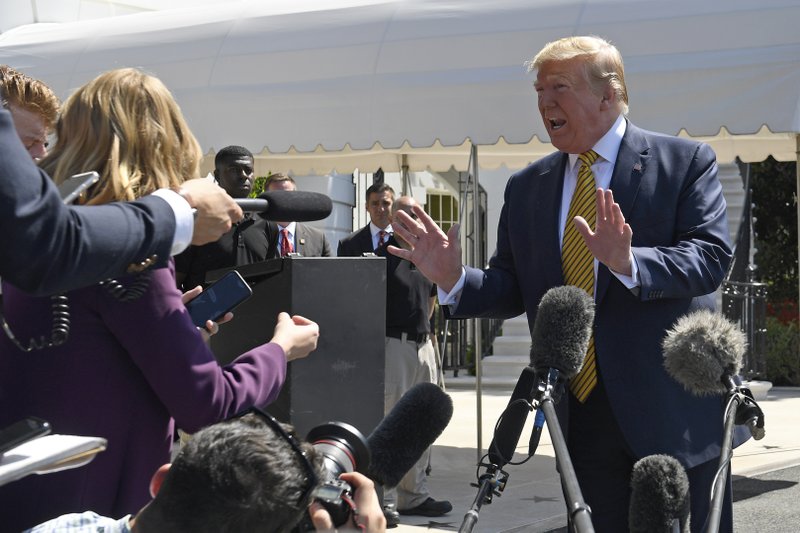 President Donald Trump speaks to reporters on the South Lawn of the White House in Washington, Saturday, June 22, 2019, before boarding Marine One for the trip to Camp David in Maryland. (AP Photo/Susan Walsh)