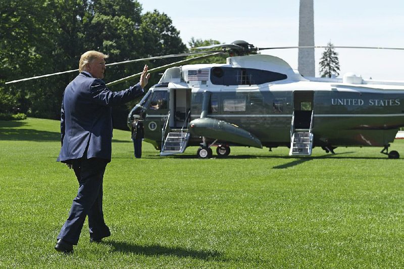 President Donald Trump crosses the South Lawn of the White House to board Marine One on Saturday for a trip to Camp David, Md. Iran was part of the weekend agenda, he told reporters as he left. 