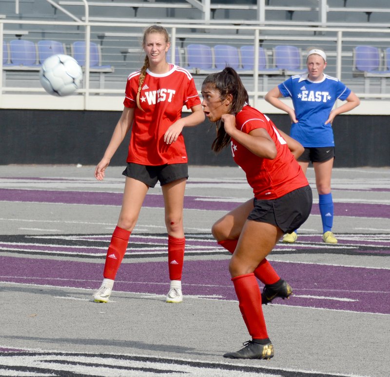 Graham Thomas/Siloam Sunday Former Siloam Springs standout Laura Morales played a ball for the West All-Stars during the Arkansas High School Coaches Association All-Star Girls Soccer Match on Friday at Estes Stadium at the University of Central Arkansas in Conway.