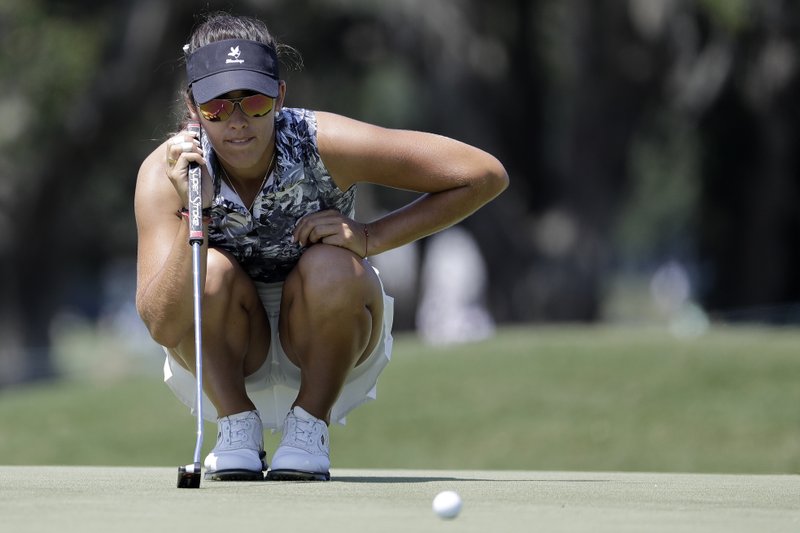 Maria Fassi of Mexico, lines up a putt on the ninth green during the third round of the U.S. Women's Open golf tournament, Saturday, June 1, 2019, in Charleston, S.C. (AP Photo/Steve Helber)