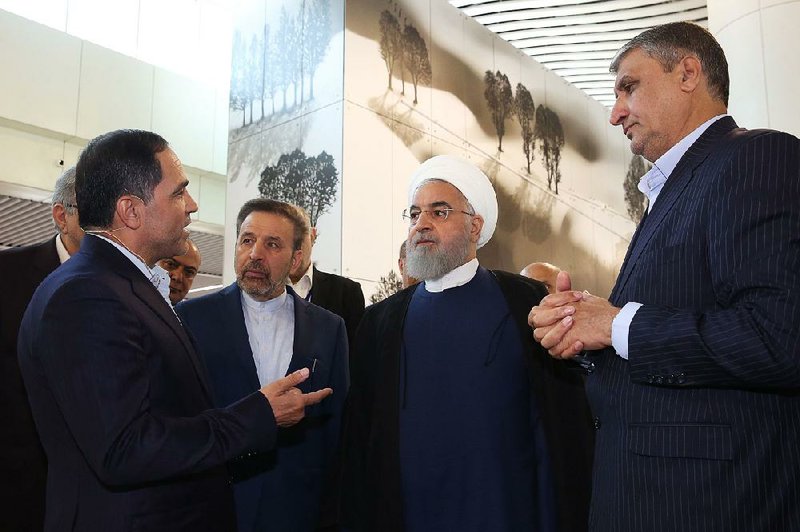 In an image provided by the Iranian government, President Hassan Rouhani of Iran, second from right, visits a new terminal at the airport in Tehran, June 18, 2019. While the Europeans want to preserve the Iranian nuclear deal ‚Äî which they see as important for their own security and for the stability of the Middle East ‚Äî they are basically powerless in the face of American clout.