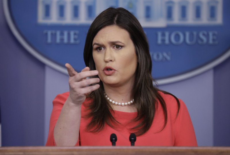 FILE - In this Jan. 28, 2019, file photo, White House press secretary Sarah Sanders speaks during a press briefing at the White House in Washington. (AP Photo/ Evan Vucci)