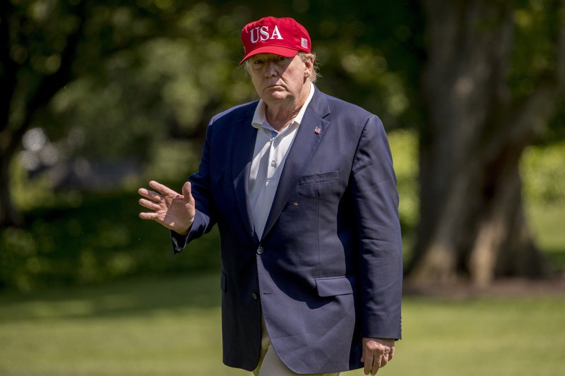 President Donald Trump arrives to the South Lawn of the White House in Washington, Sunday, June 23, 2019, after traveling from Trump National Golf Club in Sterling, Va. (AP Photo/Andrew Harnik)