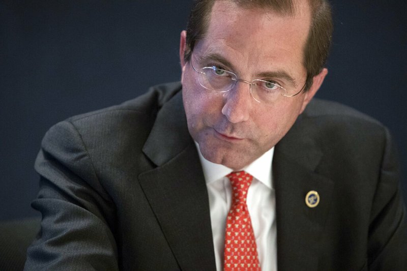 FILE - In this Wednesday, Sept. 12, 2018 file photo, Health & Human Services Secretary Alex Azar speaks during an interview with The Associated Pressin New York. Administration officials say President Donald Trump will sign an executive order on Monday that calls for hospitals to disclose upfront actual prices for common tests and procedures. Azar says it will give patients information that they can use to keep costs down. For example, if a hospital charges $3,500 for a type of echocardiogram and the same test might cost $550 in a doctor’s office, the patient might go for the lower price to save on copays. (AP Photo/Mary Altaffer)