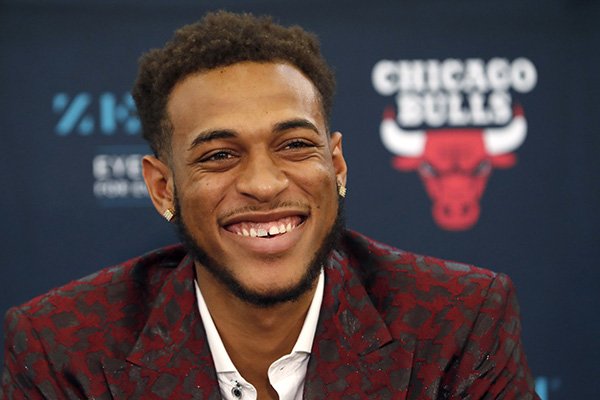 Chicago Bulls second-round pick, Arkansas power forward Daniel Gafford, laughs during an NBA basketball news conference Monday, June 24, 2019, in Chicago. (AP Photo/Charles Rex Arbogast)