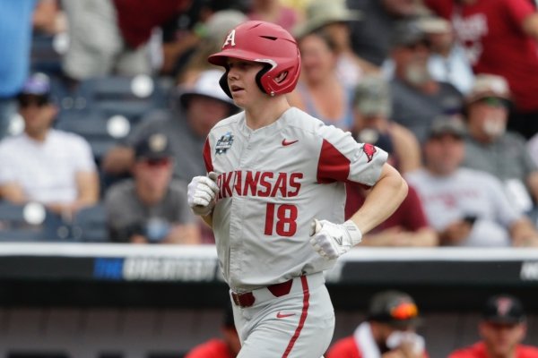 Arkansas' Heston Kjerstad (18) runs the bases after hitting a solo home run against Texas Tech in the second inning of an NCAA College World Series baseball game in Omaha, Neb., Monday, June 17, 2019. (AP Photo/Nati Harnik)