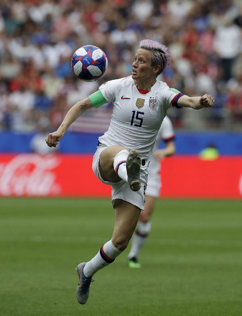 Megan Rapinoe of the United States controls the ball during the Women’s World Cup round of 16 match against Spain on Monday at the Stade Auguste-Delaune in Reims, France. Rapinoe converted a pair of penalty kicks for the U.S. in its 2-1 victory.