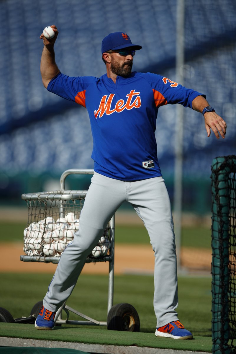 New York Mets manager Mickey Callaway pitcher batting practice before a baseball game against the Philadelphia Phillies, Monday, June 24, 2019, in Philadelphia. (AP Photo/Matt Slocum)