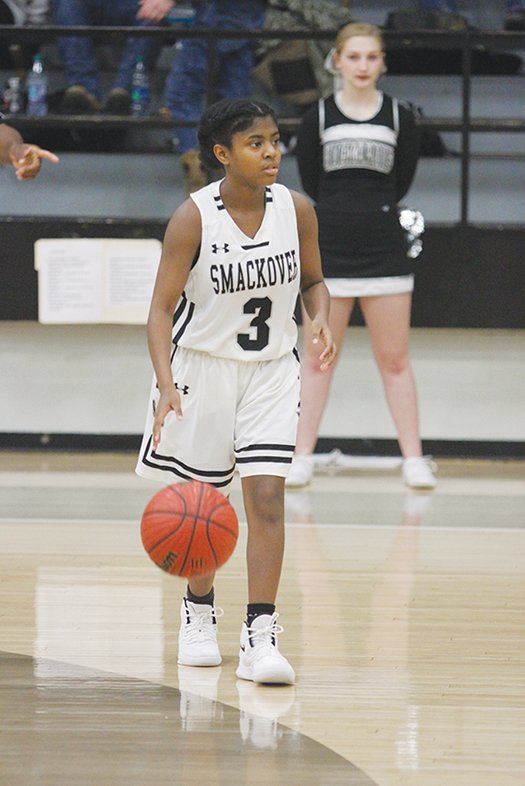 Terrance Armstard/News-Times Smackover's Brooke Patton brings the ball up the floor during the Lady Bucks’ game against Strong during the 2018-19 season. The Lady Bucks recently hired former standout Makara Frazier as their girls basketball coach.