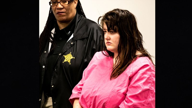 McKenna Belcher, 27, appears Friday morning before District Judge Wren Autrey, not pictured. Belcher is accused of capital murder in the death of her 3-year-old stepdaughter. Belcher also faces a charge of second-degree domestic battery involving her 2-year-old stepson.