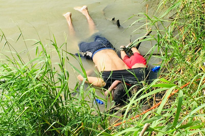 The bodies of Salvadoran migrant Oscar Alberto Mart&#237;nez Ram&#237;rez and his nearly 2-year-old daughter Valeria lie on the bank of the Rio Grande in Matamoros, Mexico, Monday, June 24, 2019, after they drowned trying to cross the river to Brownsville, Texas. Martinez' wife, Tania told Mexican authorities she watched her husband and child disappear in the strong current. This photograph was first published in the Mexican newspaper La Jornada. (AP Photo/Julia Le Duc)