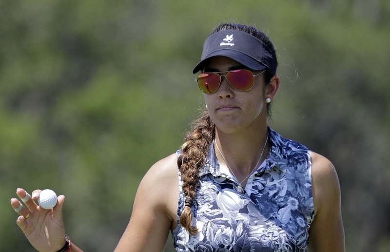 Maria Fassi of Mexico, reacts to a birdie putt on the ninth green during the third round of the U.S. Women's Open golf tournament, Saturday, June 1, 2019, in Charleston, S.C. 