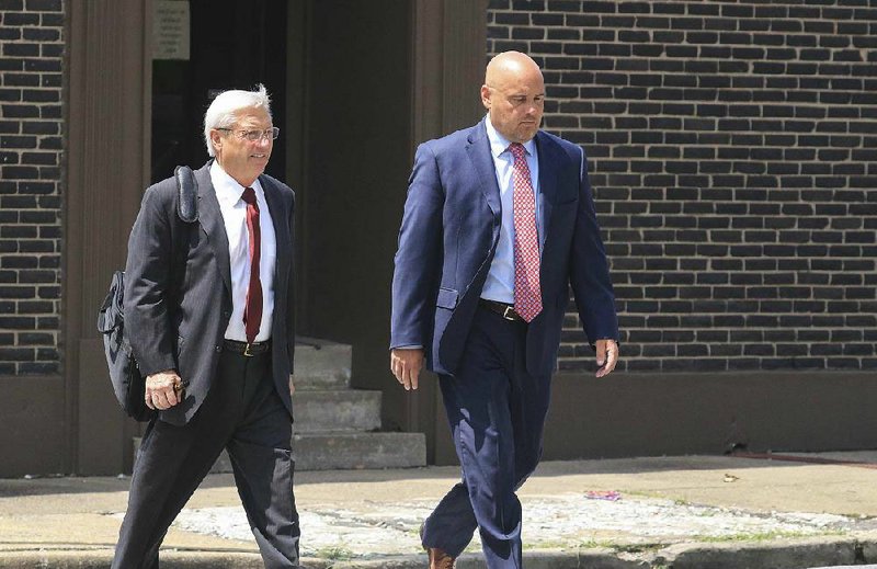 FILE — Former Arkansas Sen. Jeremy Hutchinson, right, arrives at the federal courthouse in Little Rock with his attorney, Tim Dudley.