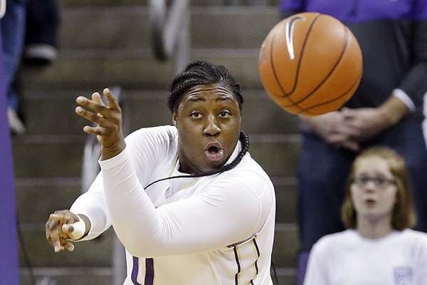 Washington's Chantel Osahor flings the ball up court after rebounding against Colorado during the first half of an NCAA college basketball game Thursday, Feb. 23, 2017, in Seattle. (AP Photo/Elaine Thompson)