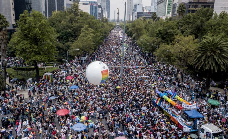 Revelers fill Mexico City's Reforma avenue during the gay pride parade, Saturday, Jun. 29, 2019. (AP Photo/Christian Palma)